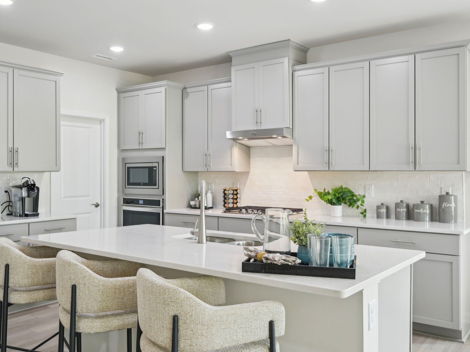 The spacious kitchen features a walk-in pantry, fit for a home chef.