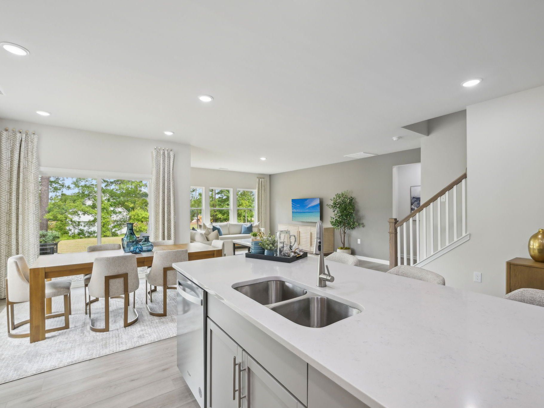 The spacious kitchen features a walk-in pantry, fit for a home chef.