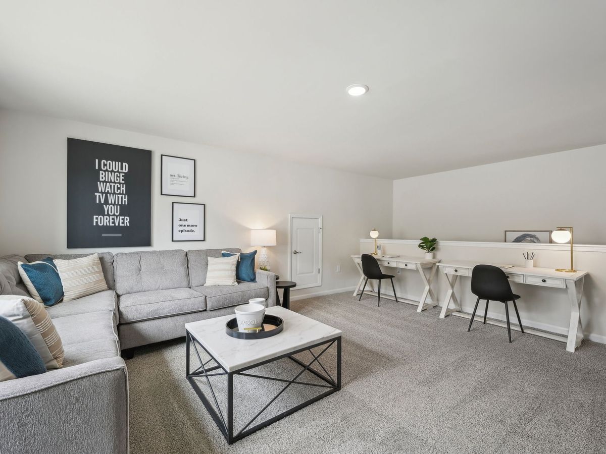 Outfit the upstairs loft as a secondary entertainment and working space.