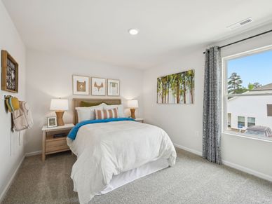 Three secondary bedrooms surround the upstairs loft.