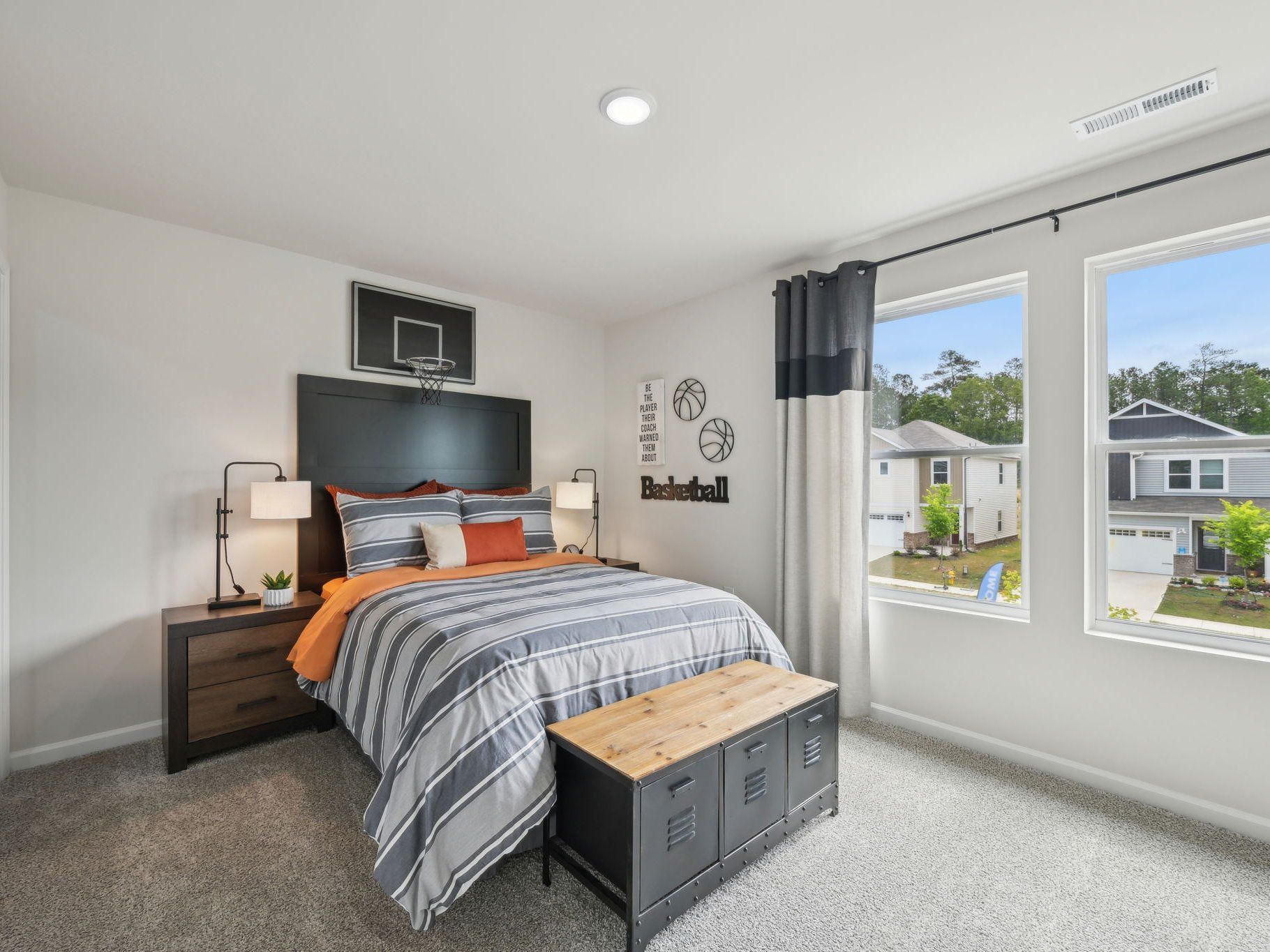 Three secondary bedrooms surround the upstairs loft.