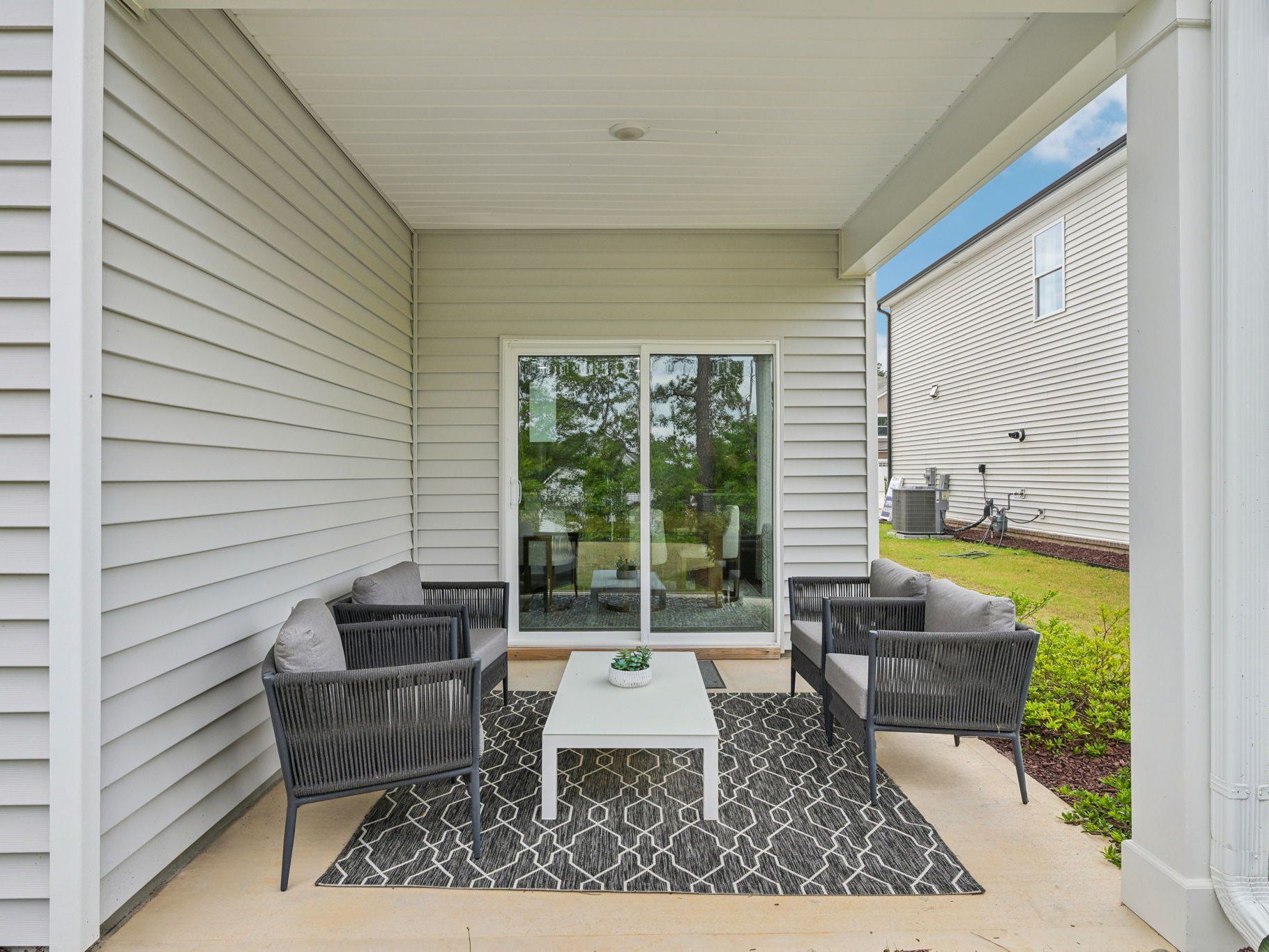 Extend your living space outside with the covered rear patio.