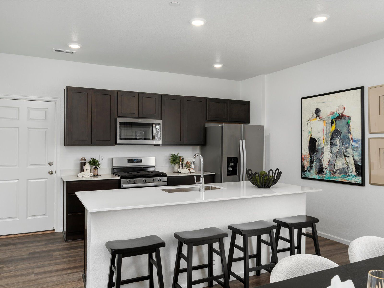The Woodland floorplan modeled at Poudre Heights in Windsor, CO