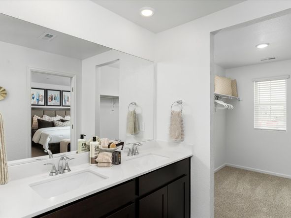 The Woodland floorplan modeled at Poudre Heights in Windsor, CO