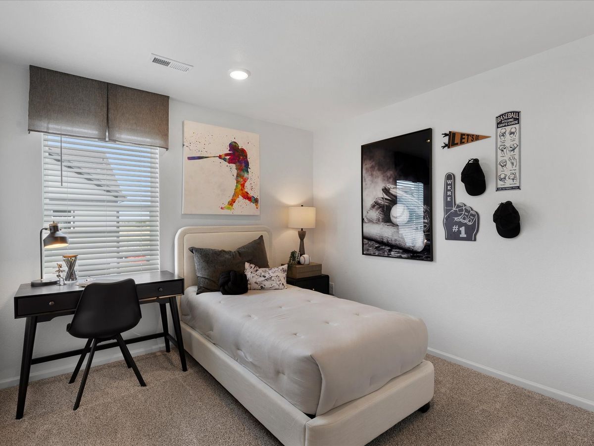 The Woodland floorplan modeled at Poudre Heights in Windsor, CO