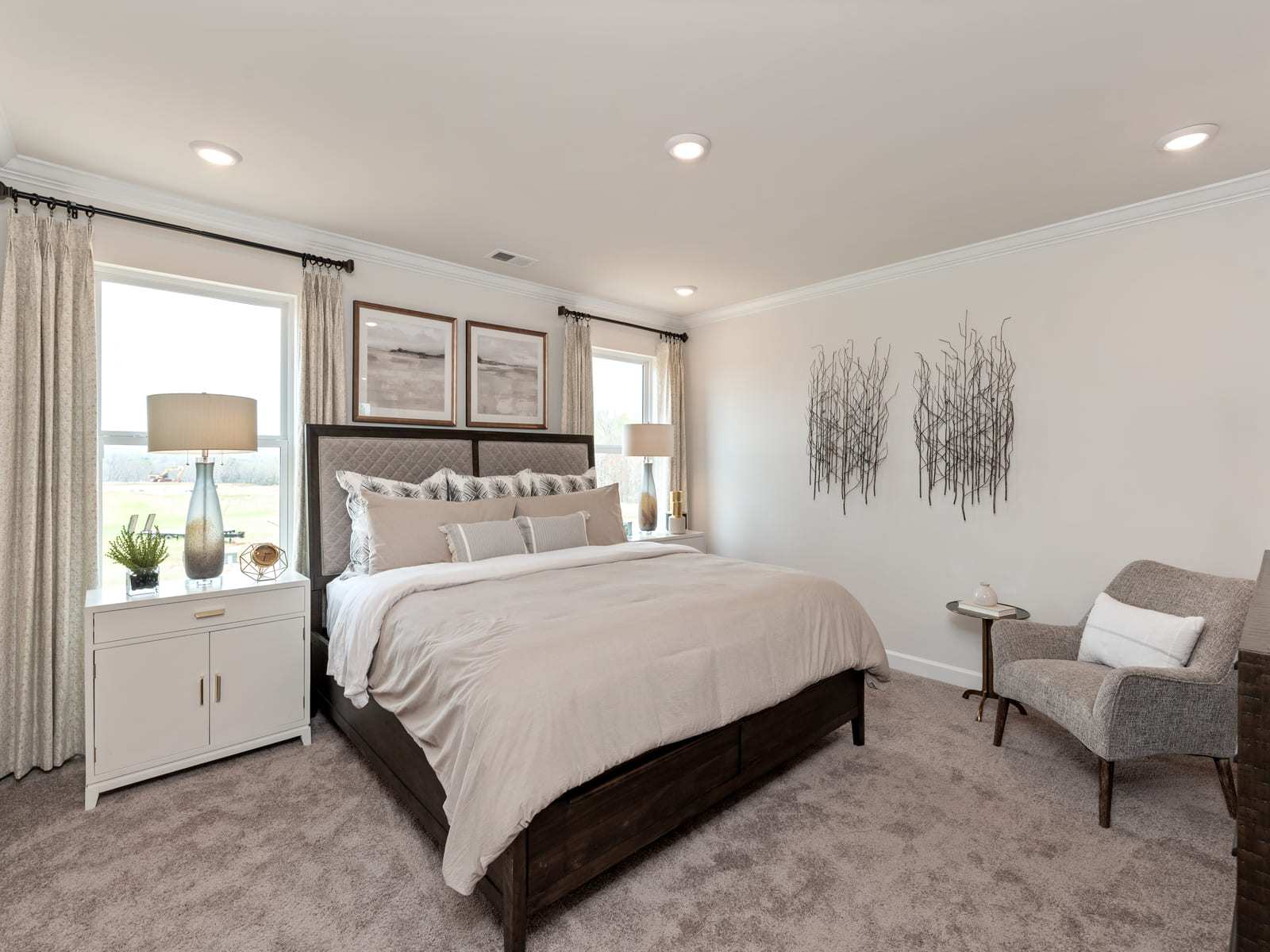 The stunning primary suite is a private retreat to relax and unwind.