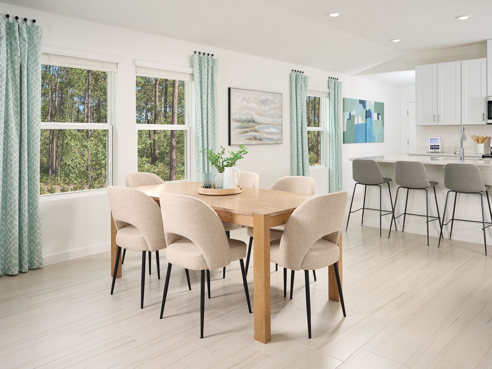 The Acadia floorplan dining area modeled at Flagler Village.