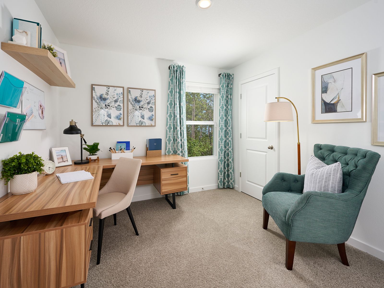 The Acadia floorplan secondary bedroom modeled at Flagler Village.