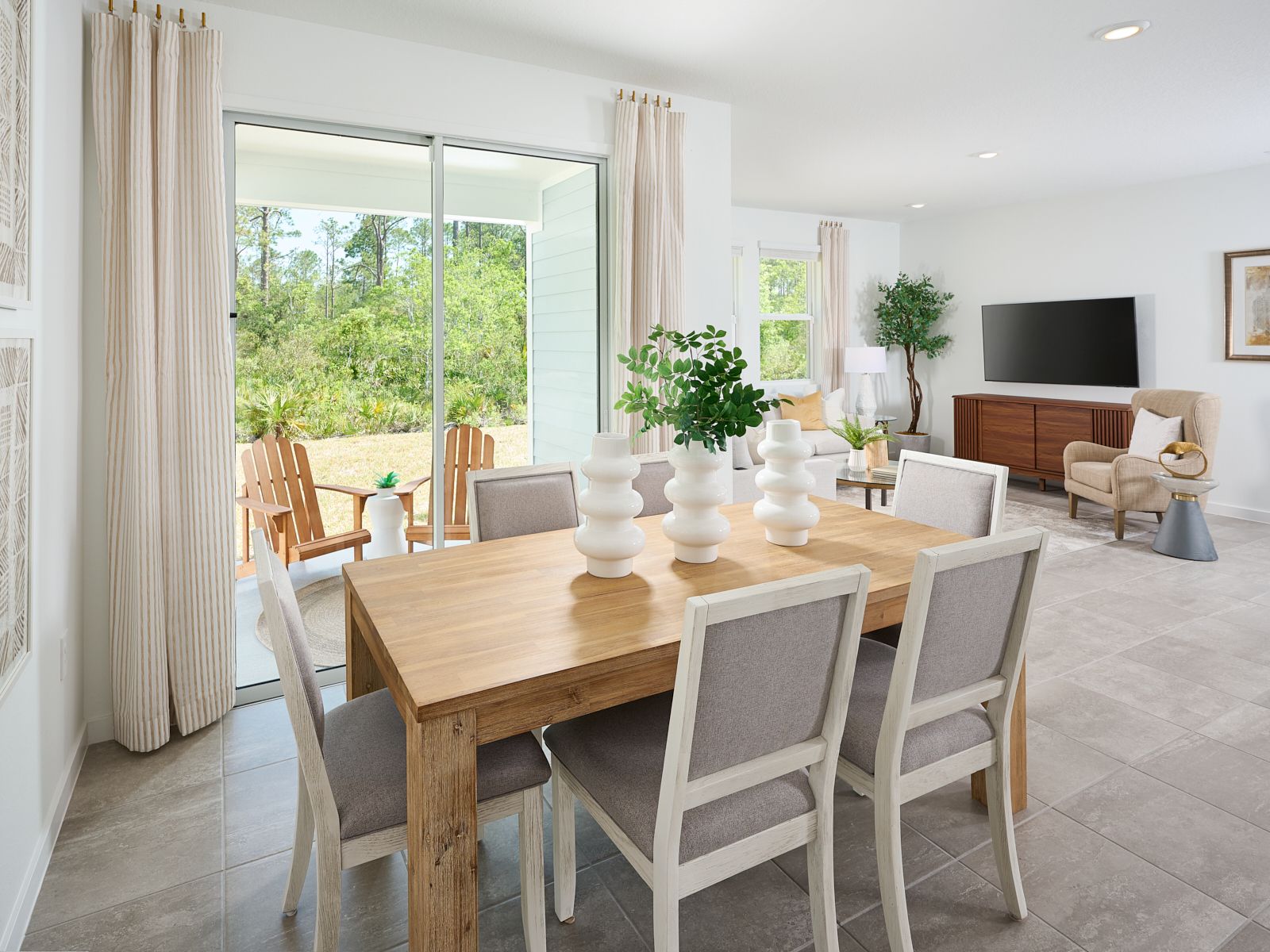 The Azalea floorplan dining area modeled at Flagler Village.