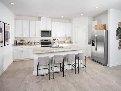 The Davenport floorplan kitchen modeled at Kings Preserve.