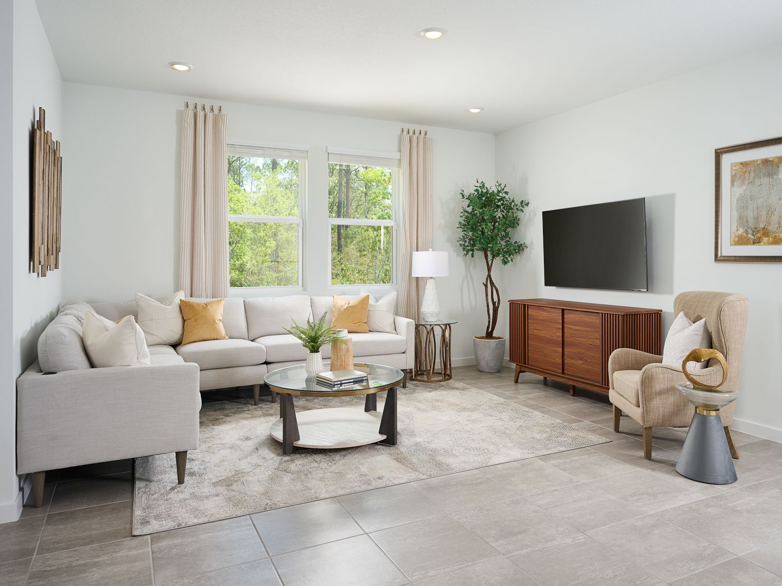 The Azalea floorplan family room modeled at Flagler Village.