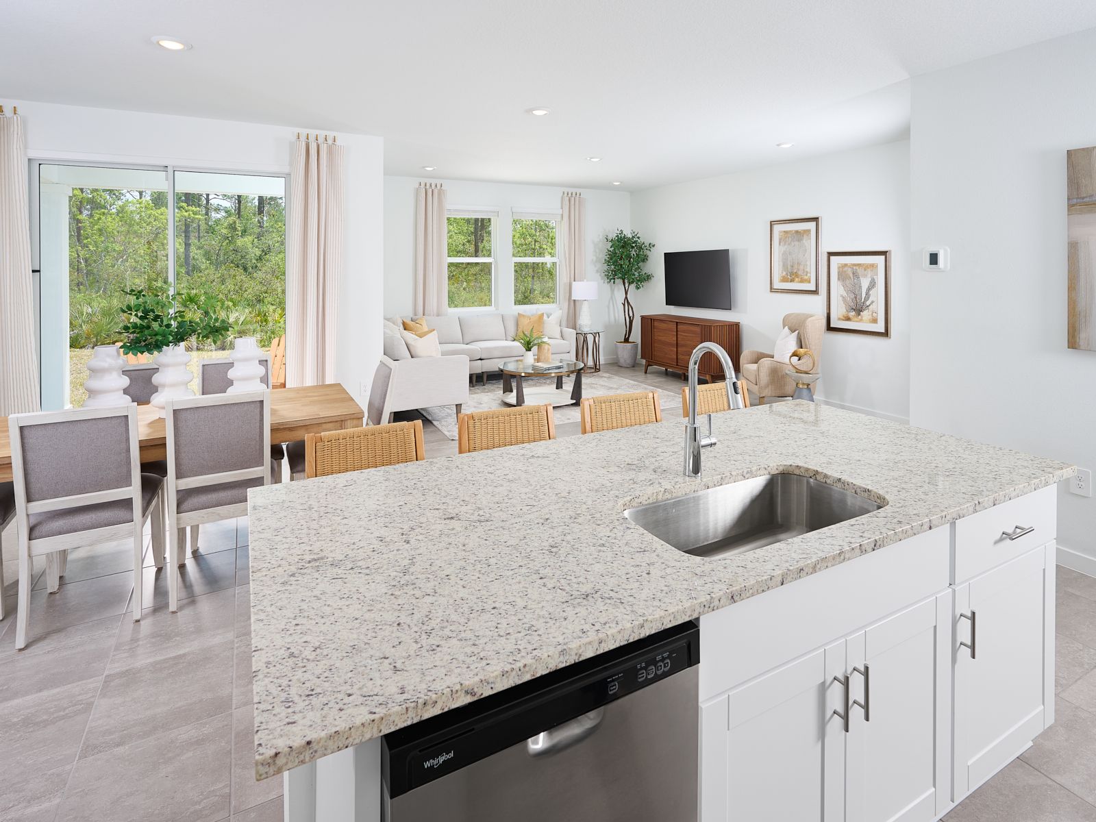 The Azalea floorplan great room modeled at Flagler Village.