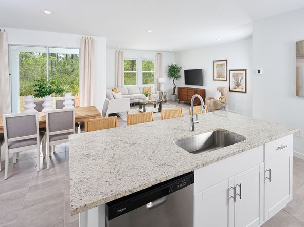 The Azalea floorplan great room modeled at Flagler Village.