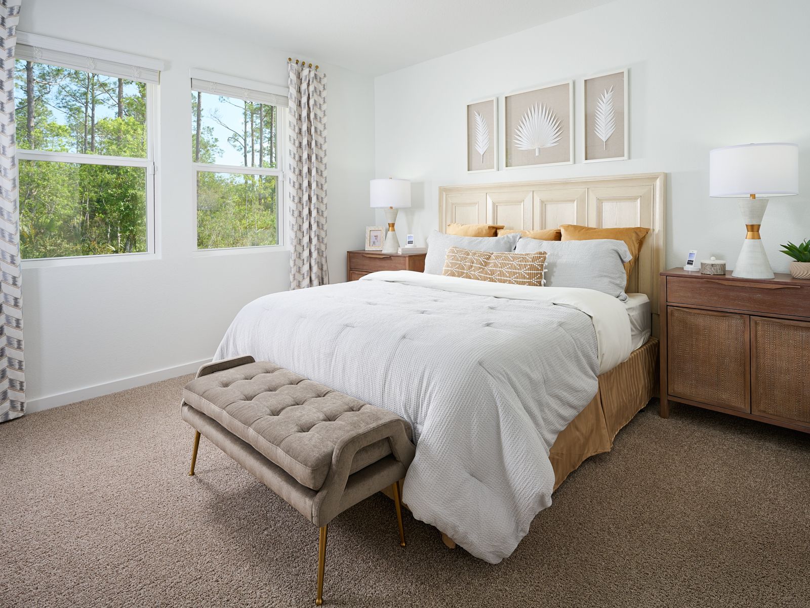 The Azalea floorplan primary bedroom modeled at Flagler Village.