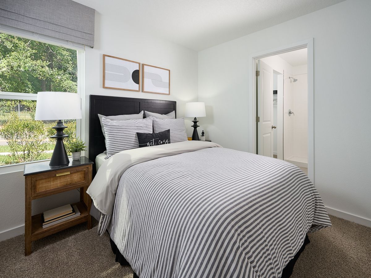 The Davenport floorplan secondary bedroom modeled at Kings Preserve.