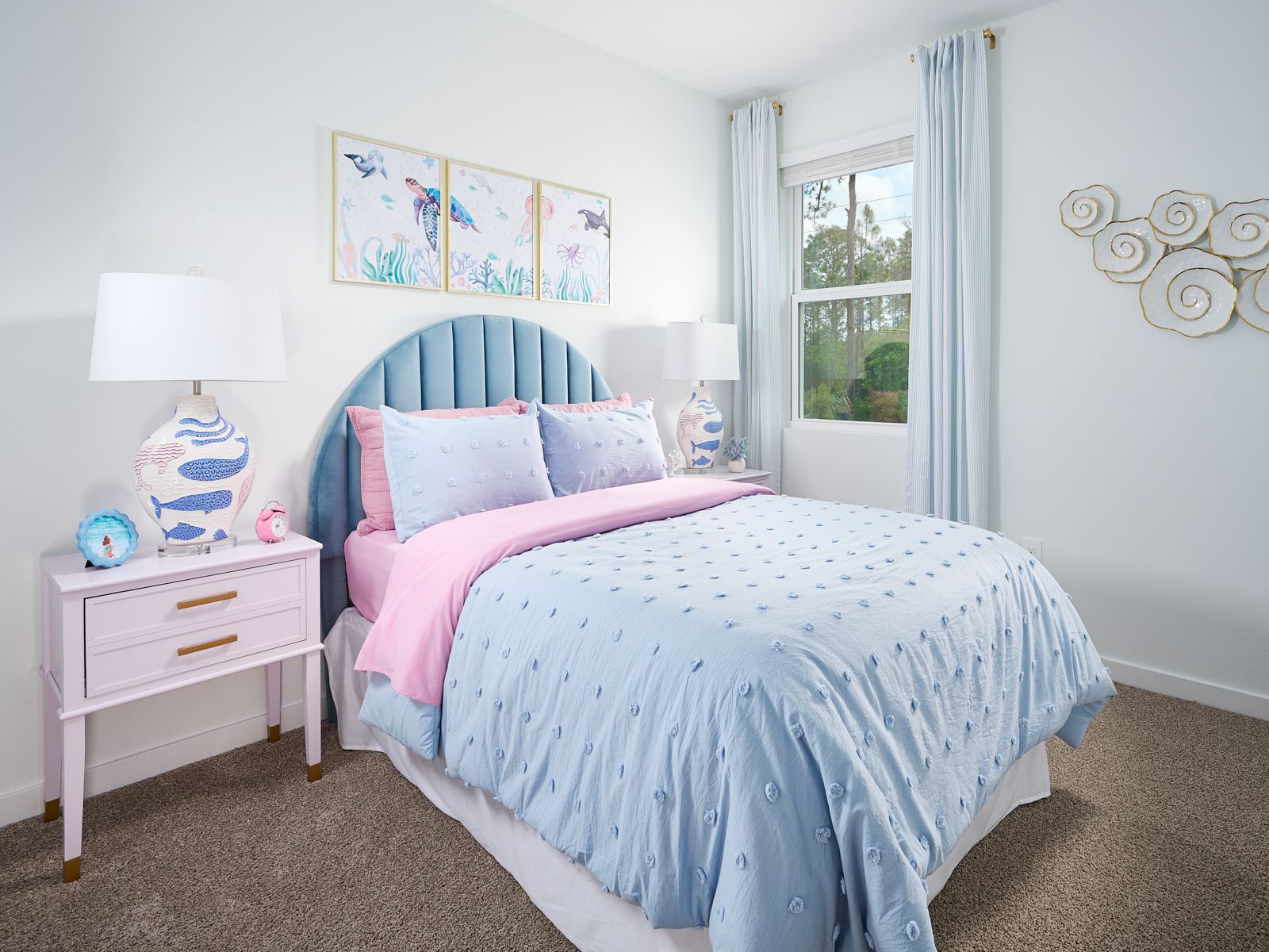 The Azalea floorplan secondary bedroom modeled at Flagler Village.