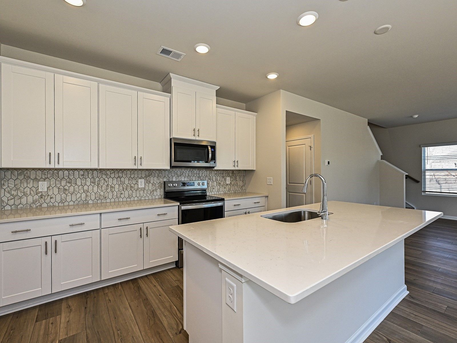 Cook your favorite meals in the spacious, modern kitchen.