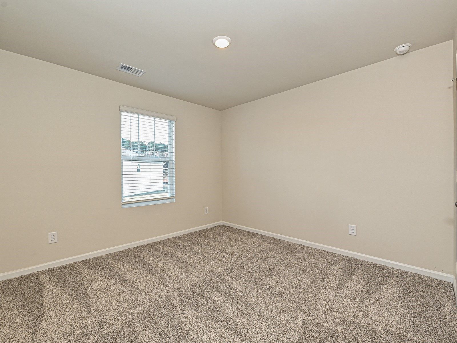 This secondary bedroom is perfect for your work-from-home office.