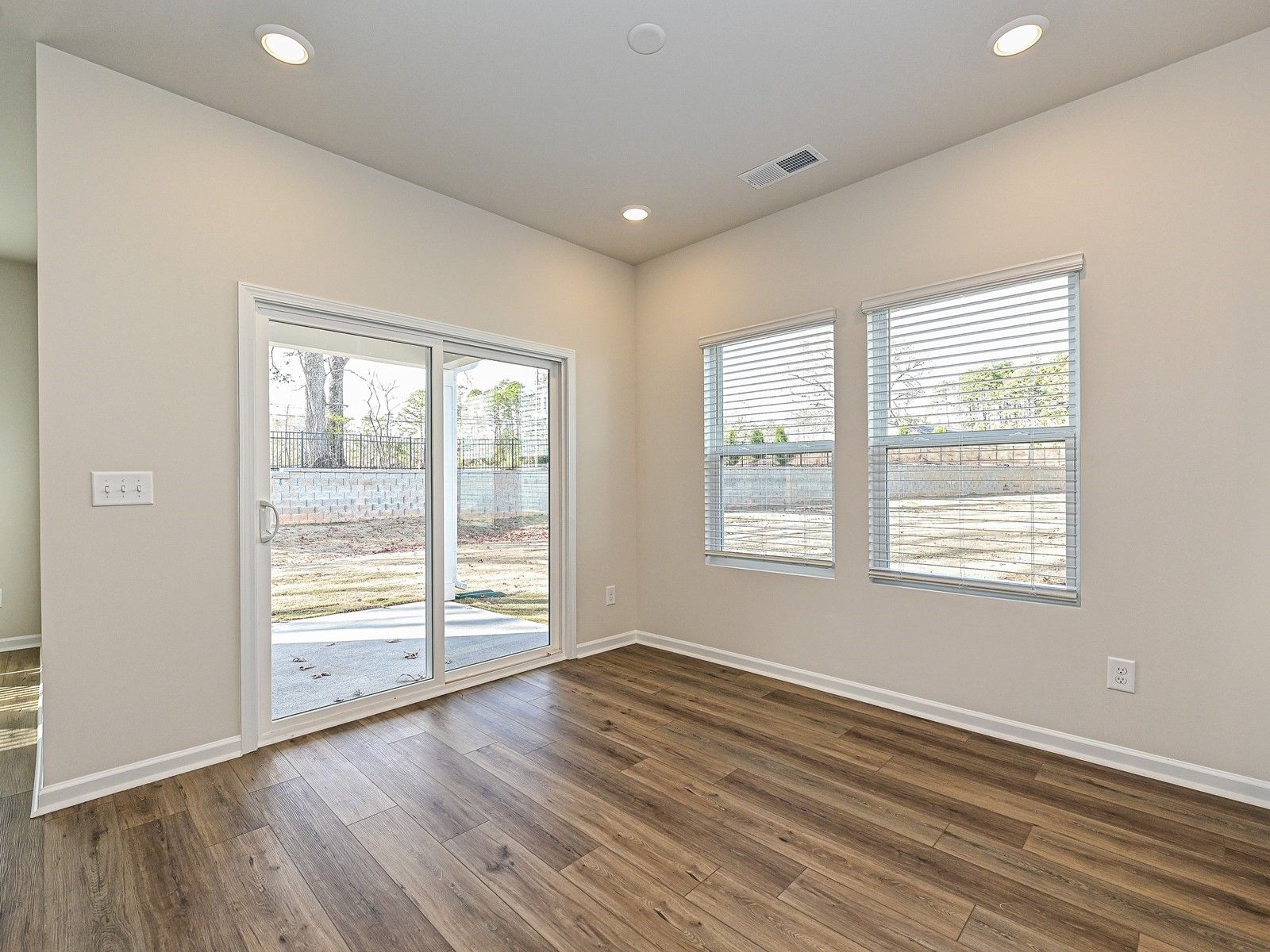 The finished back patio is conveniently connected to the great room.
