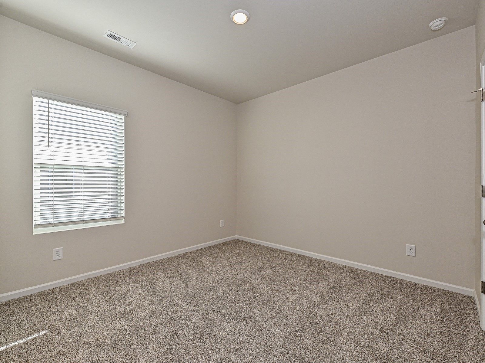 The secondary bedroom can be customized into your personal work-from-home office.