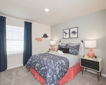 The Lancaster model features three secondary bedrooms.
