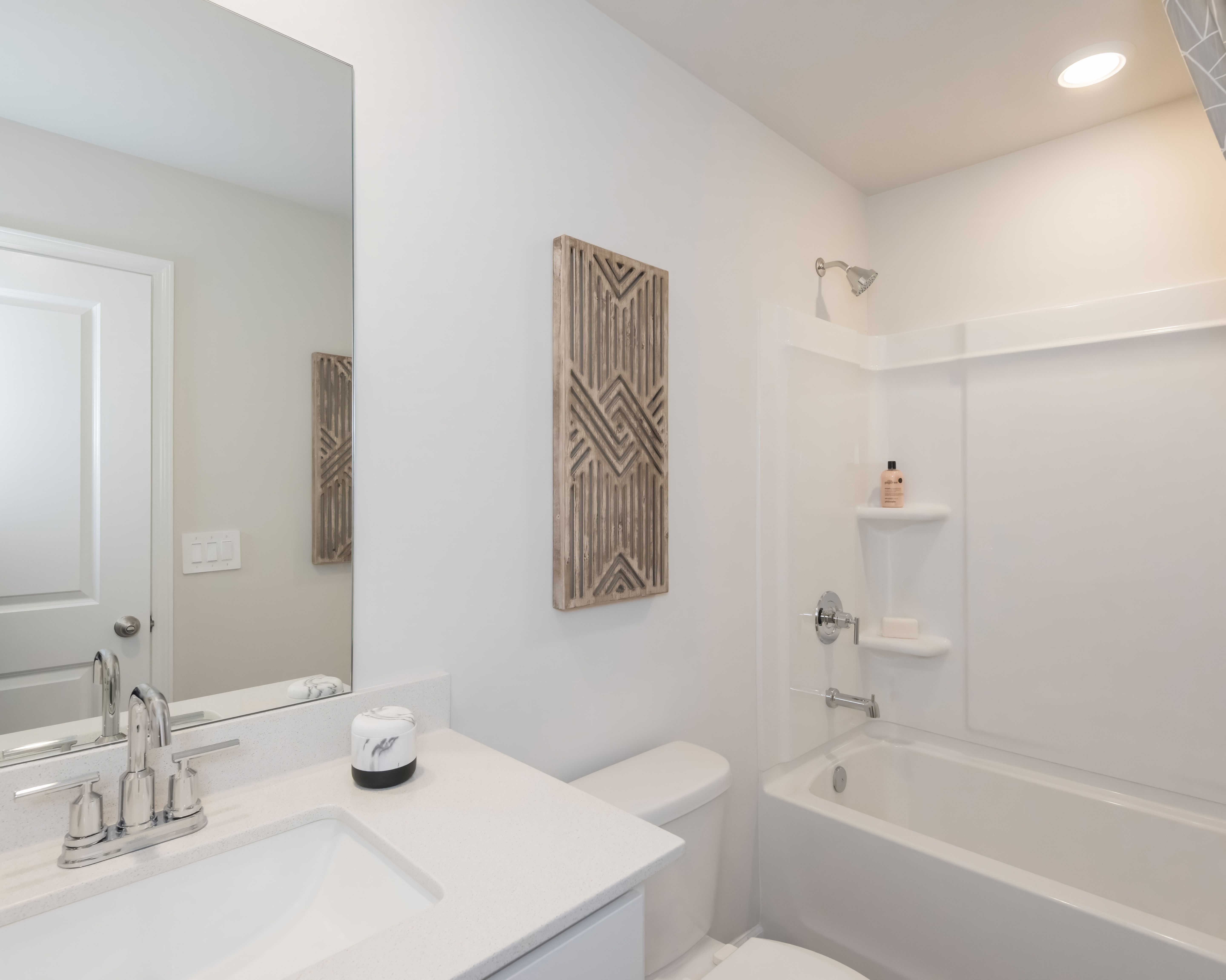 The spacious secondary bathroom gives ample space to get ready in the morning.
