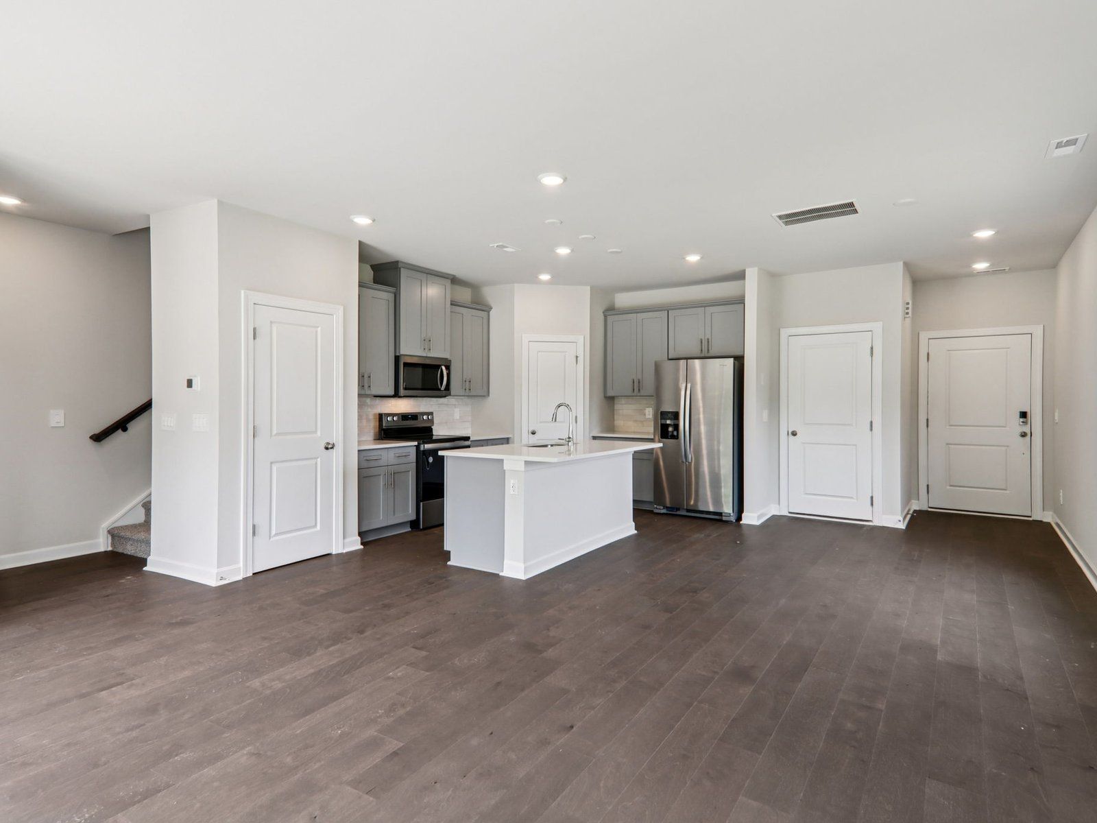 Gather friends in the great room with easy access to the kitchen for appetizers and drinks.