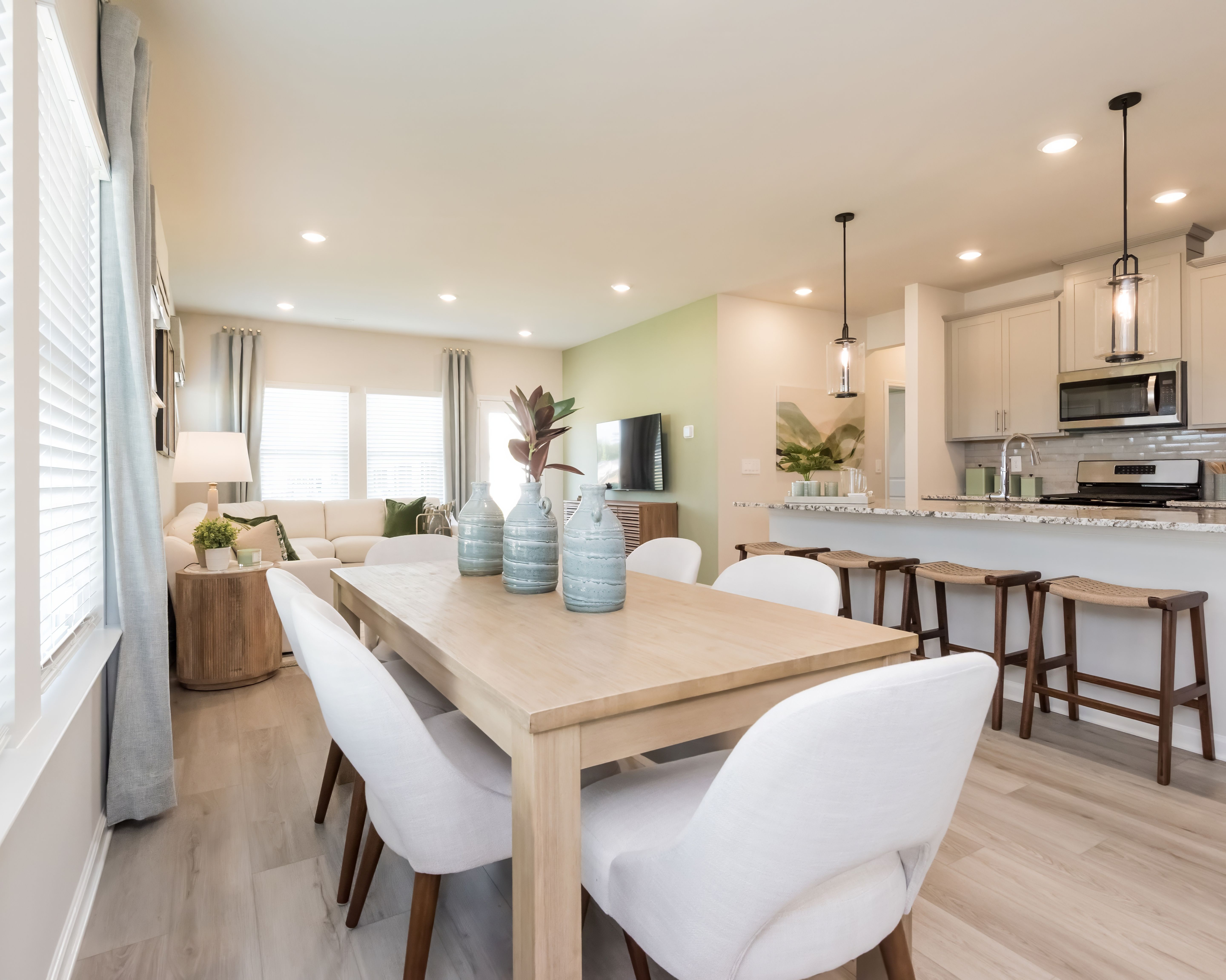 Cook, dine, and gather in this seamless main floor space.