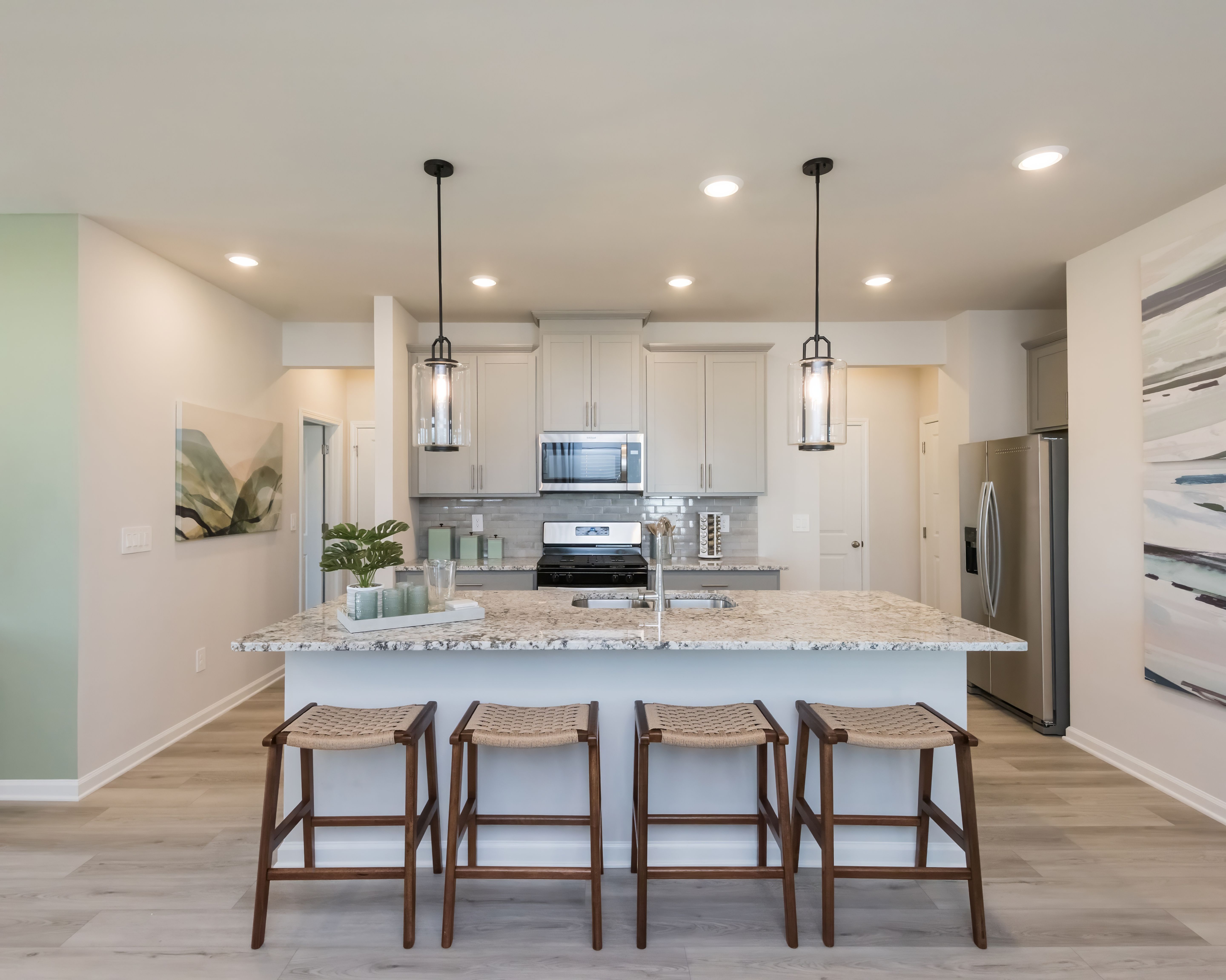 The oversized island is perfect for prep, snacks, and conversation.