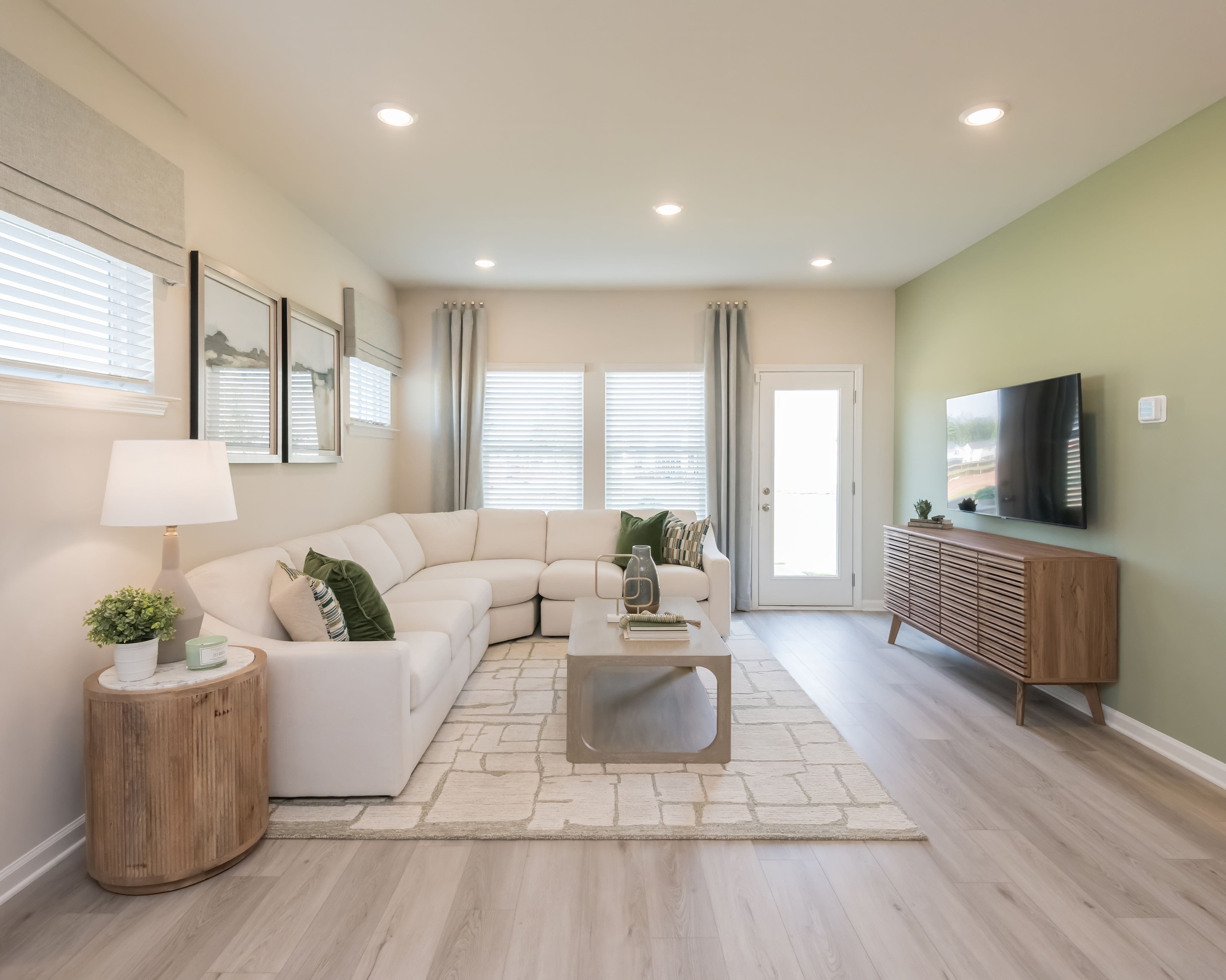 The living room is open, bright, and perfect for everyday comfort.