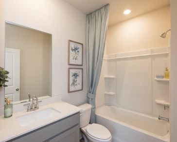 A fresh and functional bathroom for shared use.