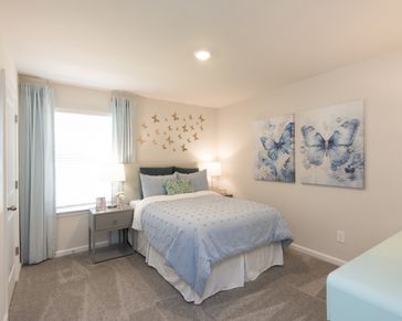 The Roswell floorplan features three secondary bedrooms.