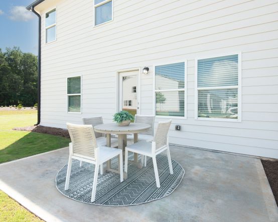 The back patio is perfect for relaxing or entertaining.