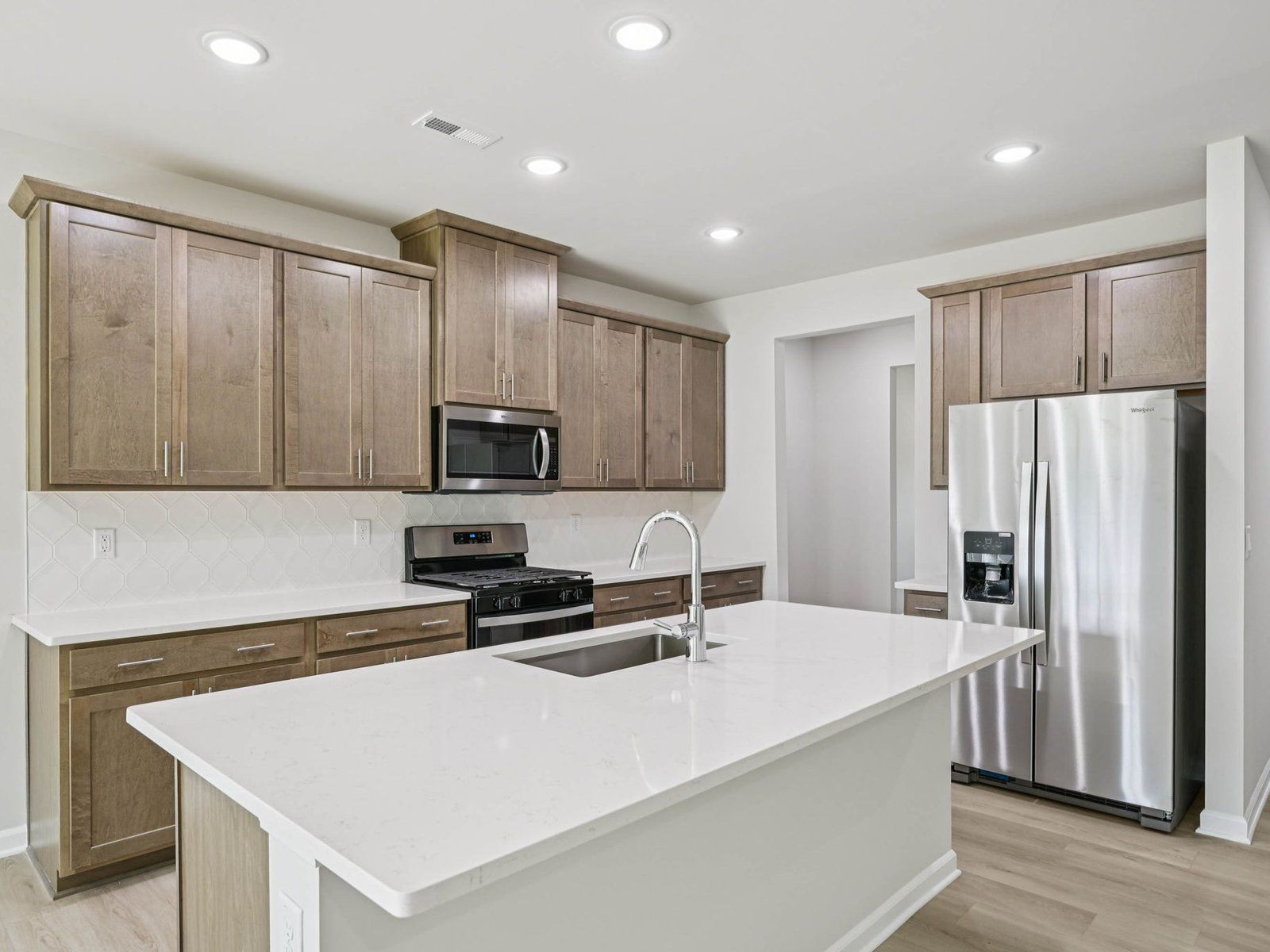 Kitchen in the Johnson floorplan at Cadence Meadows in Zebulon, NC.