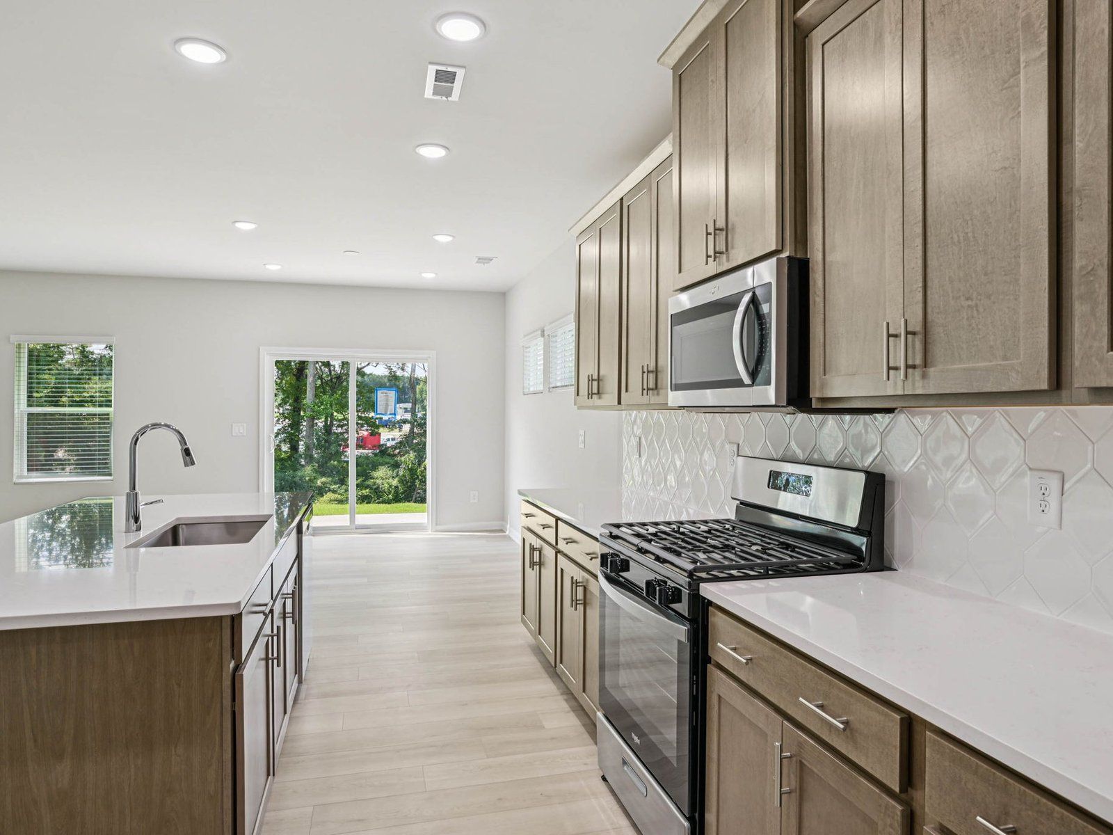 Kitchen in the Johnson floorplan at Cadence Meadows in Zebulon, NC.