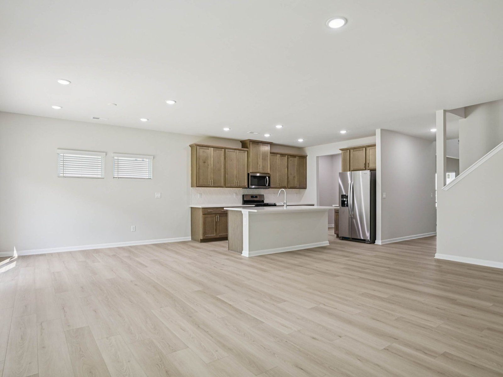 Great room in the Johnson floorplan at Cadence Meadows in Zebulon, NC.