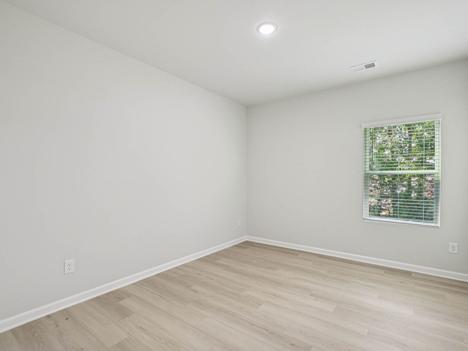 Secondary bedroom in the Johnson floorplan at Cadence Meadows in Zebulon, NC.