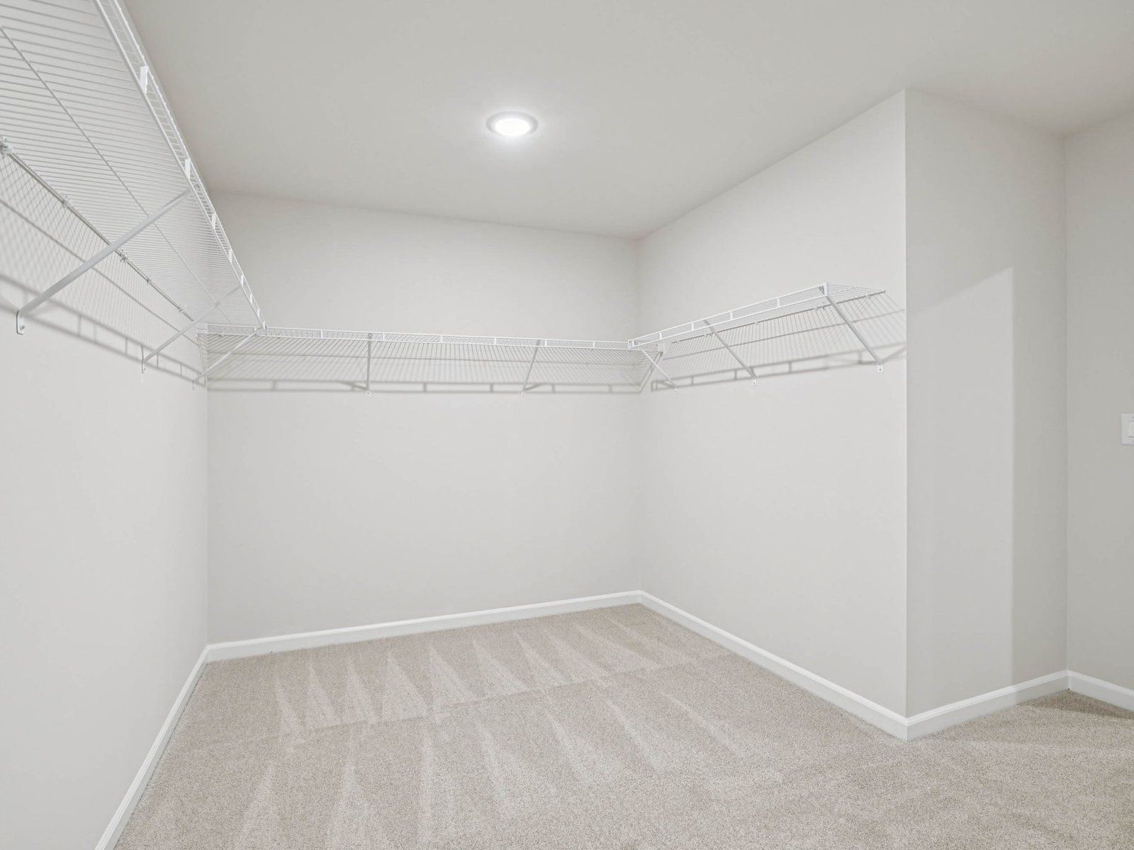 Walk-in closet in the Johnson floorplan at Cadence Meadows in Zebulon, NC.
