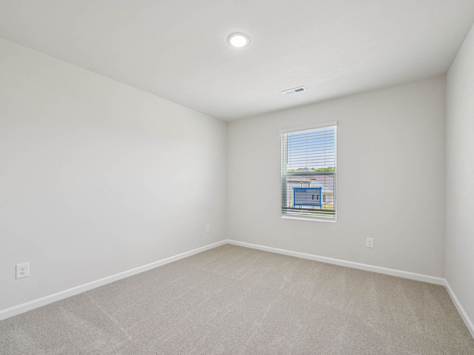 Secondary bedroom in the Johnson floorplan at Cadence Meadows in Zebulon, NC.
