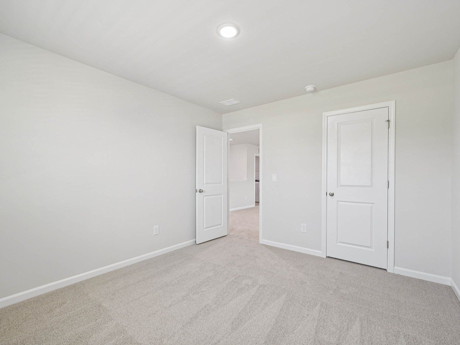 Secondary bedroom in the Johnson floorplan at Cadence Meadows in Zebulon, NC.