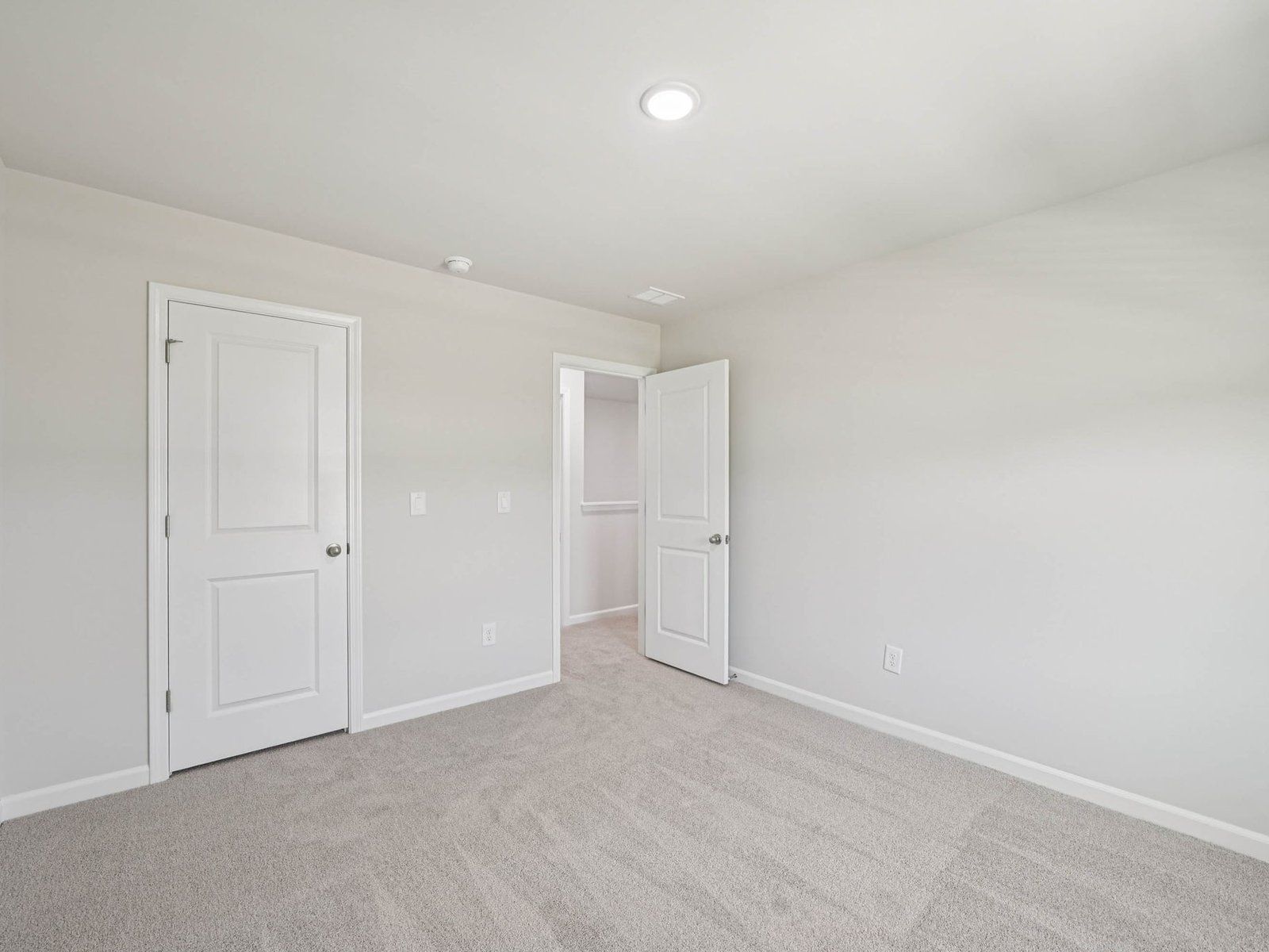 Secondary bedroom in the Johnson floorplan at Cadence Meadows in Zebulon, NC.