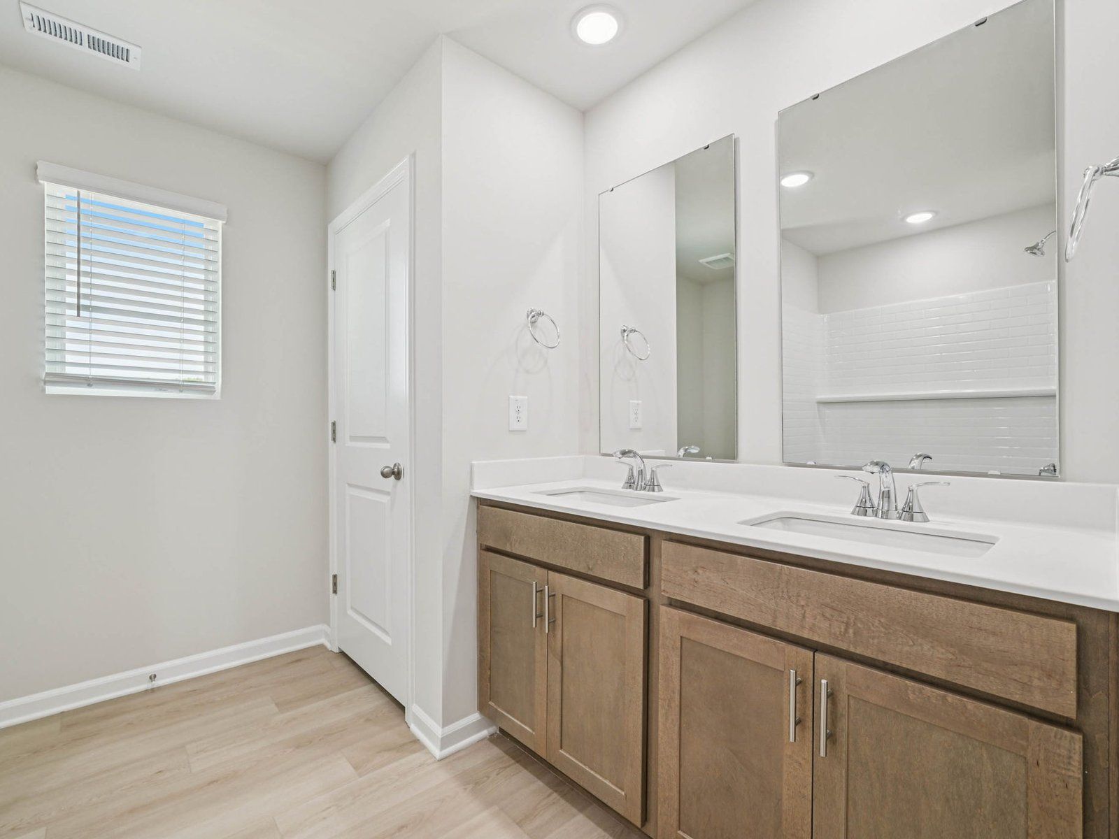 Secondary bathroom in the Johnson floorplan at Cadence Meadows in Zebulon, NC.