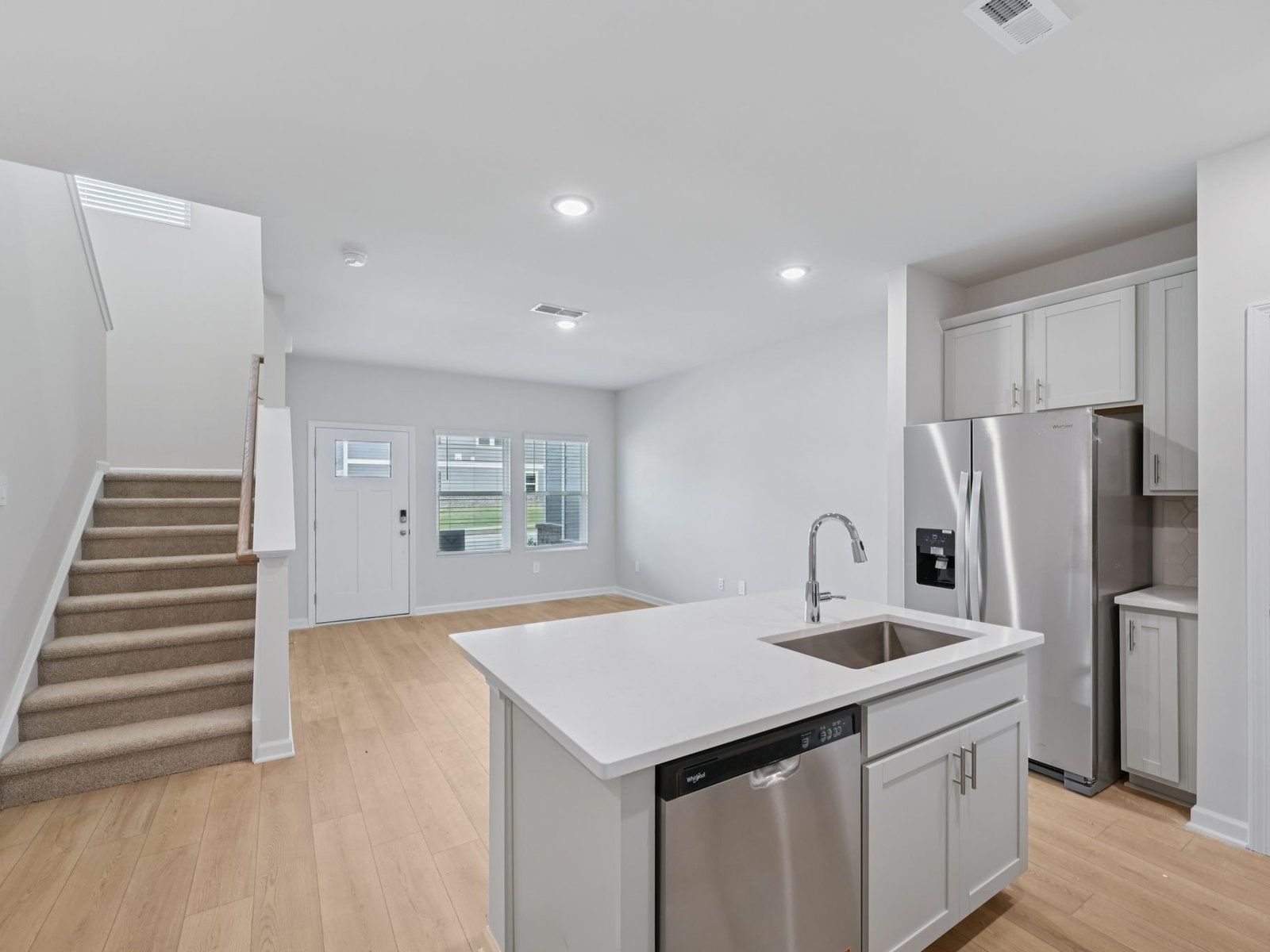 Kitchen in the Bloomfield floorplan at Cadence Meadows Townes in Zebulon, NC.