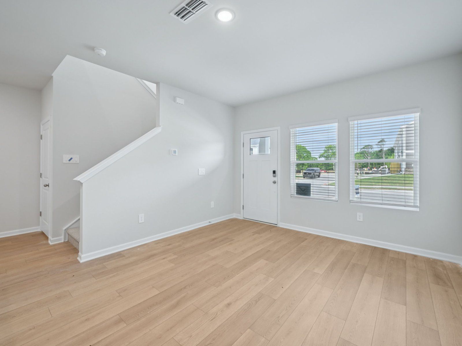 Great room in the Bloomfield floorplan at Cadence Meadows Townes in Zebulon, NC.