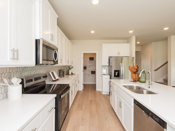Meal-prep just got easier with endless countertop and cabinet space.