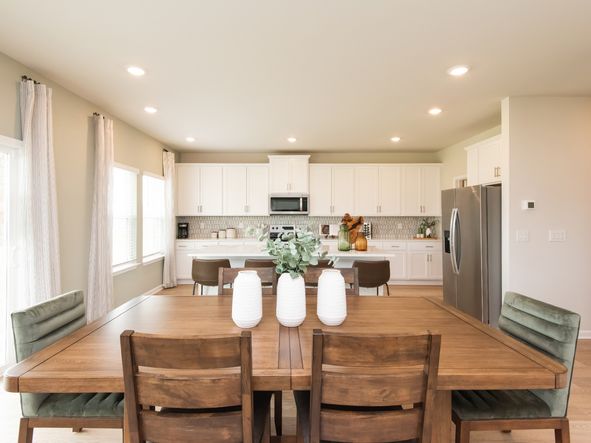Enjoy dinner parties with convenient access to the kitchen.