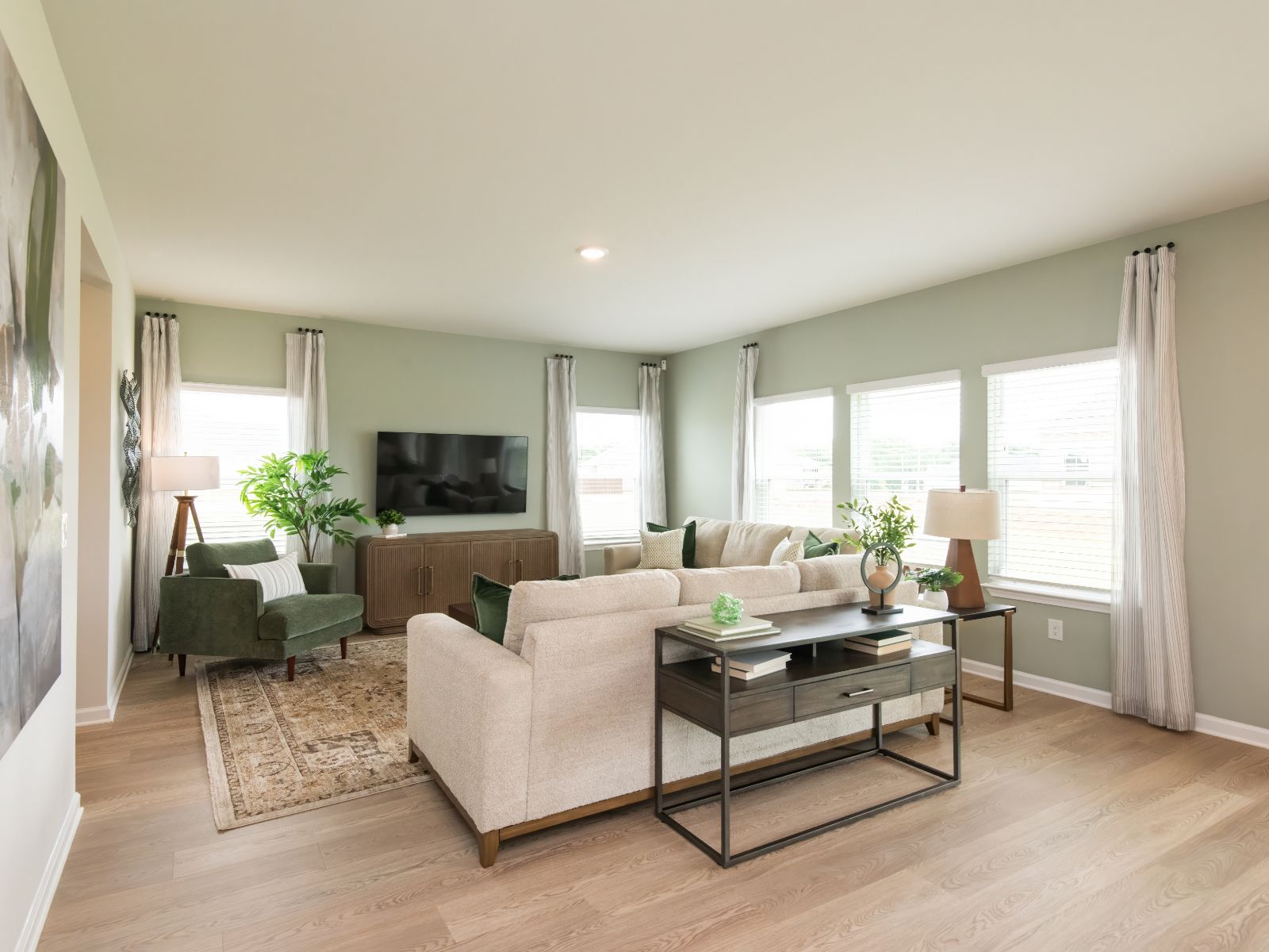 Watch your favorite movie or curl up with a good book in the great room.