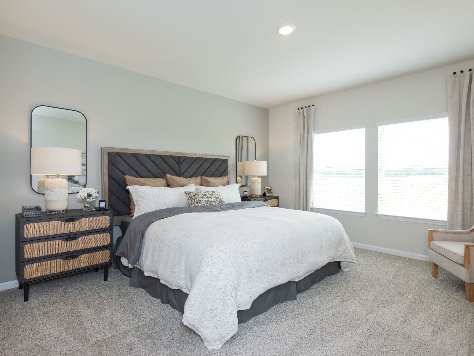 Relax and unwind in the spacious primary bedroom.