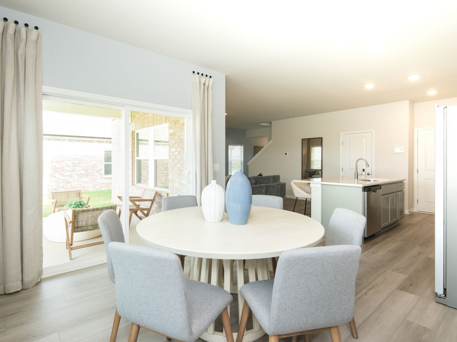 The dining area provides easy access to the outdoor patio.