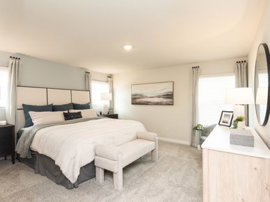 The primary bedroom is the best spot to relax and unwind after a long day.